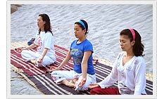 Yoga class at river side - Tapovan